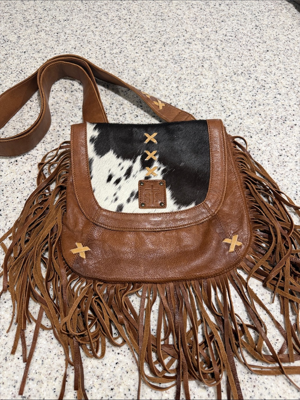 STS Ranchwear Brown Leather Fringe Crossbody with Black and White Cowhide Flap